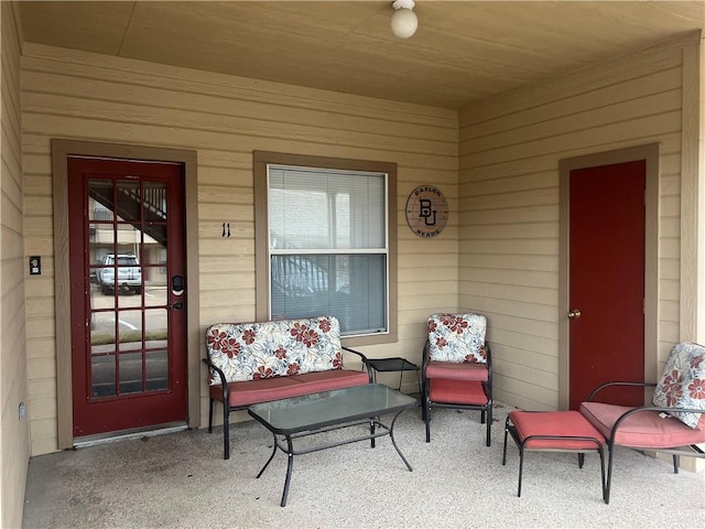 doorway to property featuring a porch