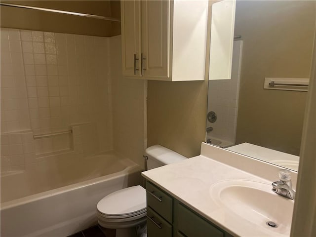 bathroom with toilet, vanity, and bathtub / shower combination
