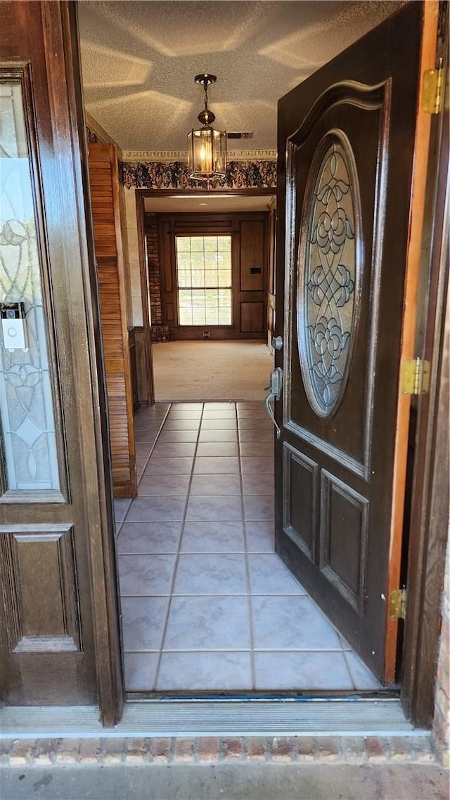 doorway to property featuring a porch