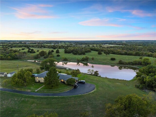 2522 S Robinson Dr, Robinson, TX 76706 - aerial view at dusk with a water view