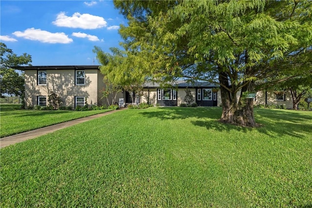 2522 S Robinson Dr, Robinson, TX 76706 - view of front of home featuring stucco siding and a front lawn