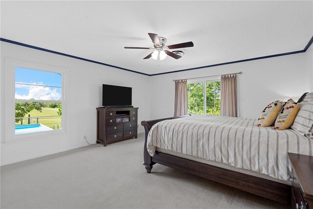 2522 S Robinson Dr, Robinson, TX 76706 - bedroom with a ceiling fan, light colored carpet, and crown molding