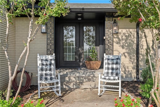 2522 S Robinson Dr, Robinson, TX 76706 - entrance to property featuring french doors and roof with shingles