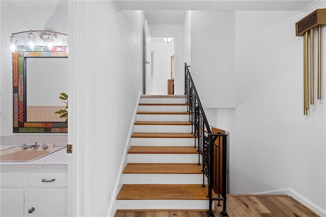 2522 S Robinson Dr, Robinson, TX 76706 - staircase with baseboards and wood finished floors