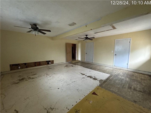 spare room with a ceiling fan