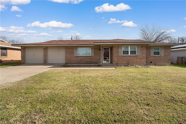 ranch-style house featuring concrete driveway, an attached garage, brick siding, and a front lawn