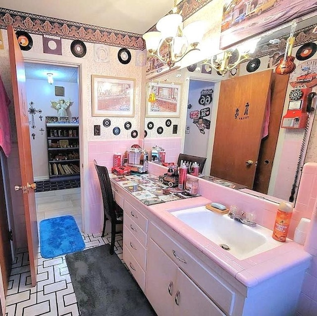 3833 Huaco Ln, Waco, TX 76710 - bathroom with vanity and a chandelier