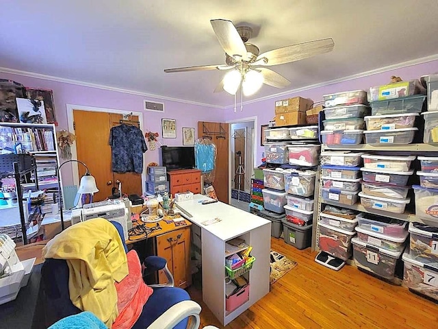 3833 Huaco Ln, Waco, TX 76710 - office space featuring crown molding, light wood-style flooring, and ceiling fan