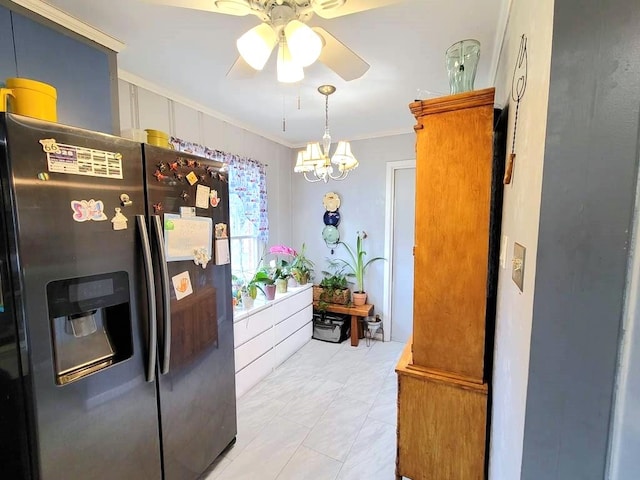 3833 Huaco Ln, Waco, TX 76710 - kitchen with stainless steel refrigerator with ice dispenser, ceiling fan, crown molding, and a chandelier