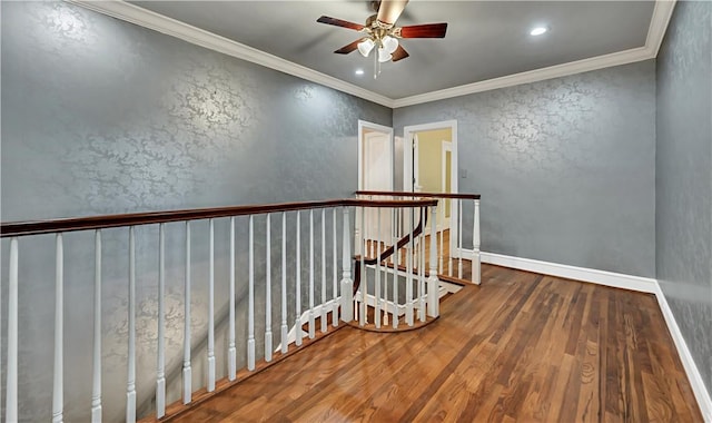 3720 Herwol Ave, Waco, TX 76710 - hall featuring baseboards, wood finished floors, ornamental molding, an upstairs landing, and a textured wall