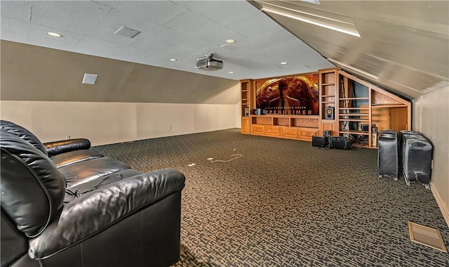 3720 Herwol Ave, Waco, TX 76710 - carpeted home theater with visible vents, baseboards, built in features, lofted ceiling, and recessed lighting
