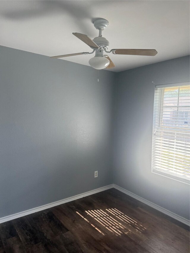 105 Wildcat Dr, Waco, TX 76705 - unfurnished room featuring wood finished floors, a ceiling fan, and baseboards