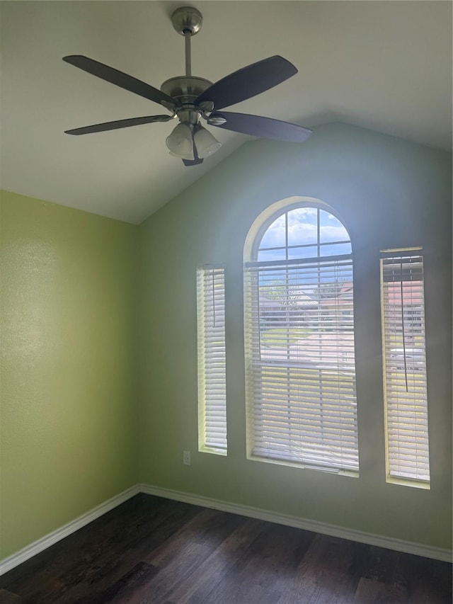 105 Wildcat Dr, Waco, TX 76705 - unfurnished room with dark wood-type flooring, ceiling fan, vaulted ceiling, and baseboards