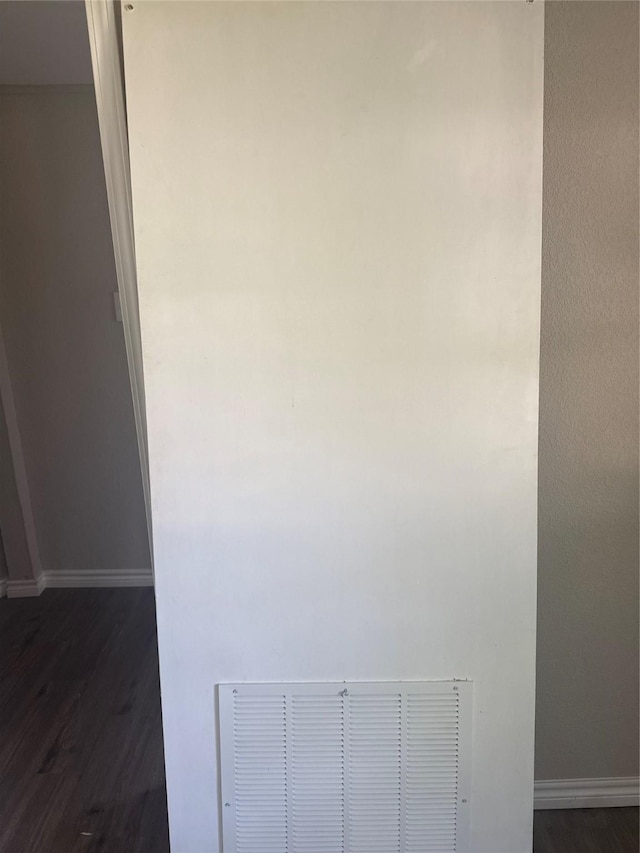 105 Wildcat Dr, Waco, TX 76705 - detailed view of wood finished floors and baseboards