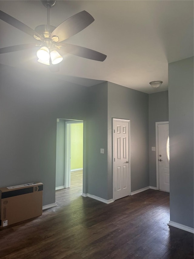 105 Wildcat Dr, Waco, TX 76705 - unfurnished room featuring ceiling fan, baseboards, and dark wood-style flooring