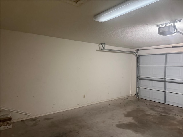 105 Wildcat Dr, Waco, TX 76705 - garage with a garage door opener and baseboards