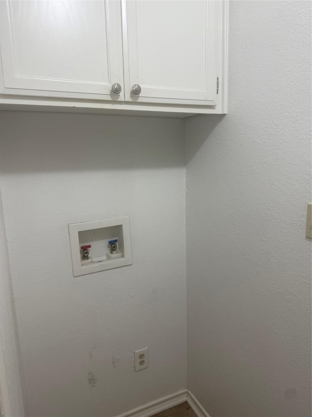 105 Wildcat Dr, Waco, TX 76705 - washroom with hookup for a washing machine, cabinet space, and baseboards