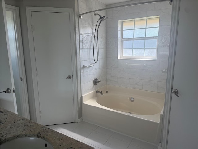 105 Wildcat Dr, Waco, TX 76705 - bathroom with tile patterned floors and shower / bathtub combination