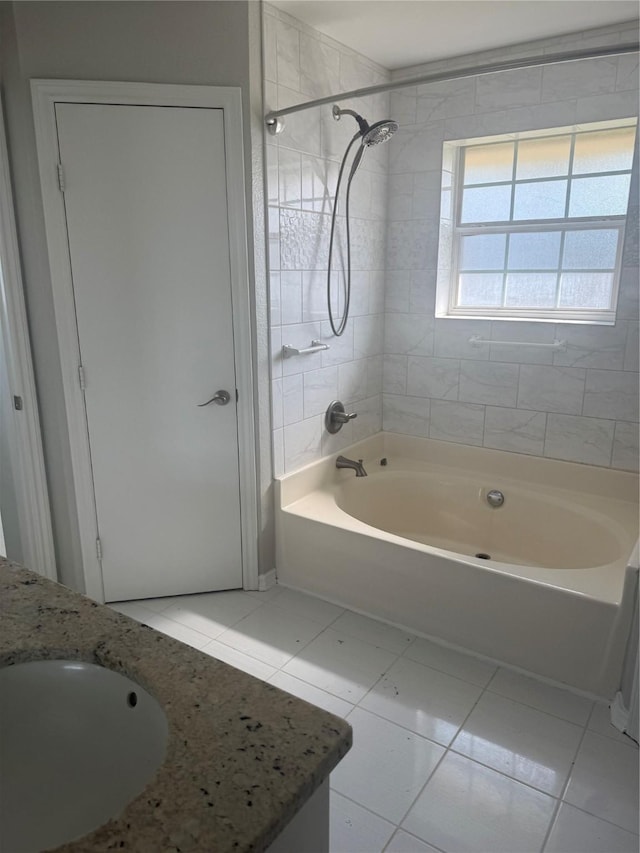 105 Wildcat Dr, Waco, TX 76705 - bathroom with tile patterned floors, vanity, and tub / shower combination