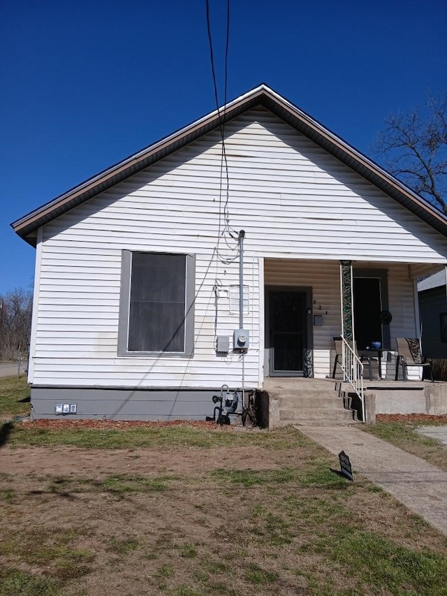 921 Preston St, Waco, TX 76704 - rear view of property with covered porch and crawl space
