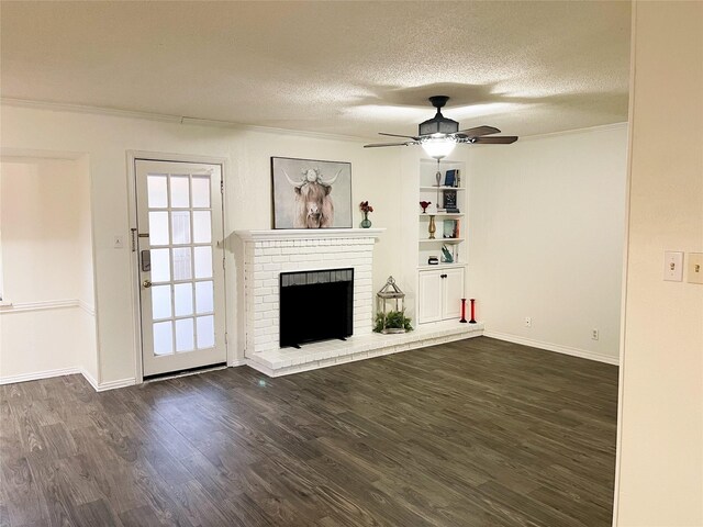 5004 Lakeshore Dr, Waco, TX 76710 - unfurnished living room featuring dark wood-style floors, a textured ceiling, crown molding, and a ceiling fan