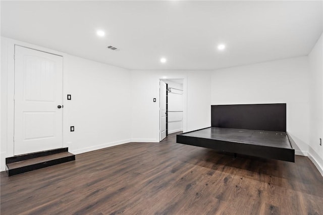 3212 Robinson Rd, Waco, TX 76706 - bedroom featuring dark wood-style floors, visible vents, recessed lighting, and baseboards