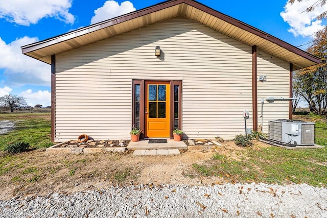 view of front of house with cooling unit