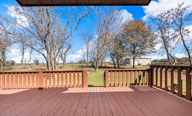 deck featuring an outbuilding