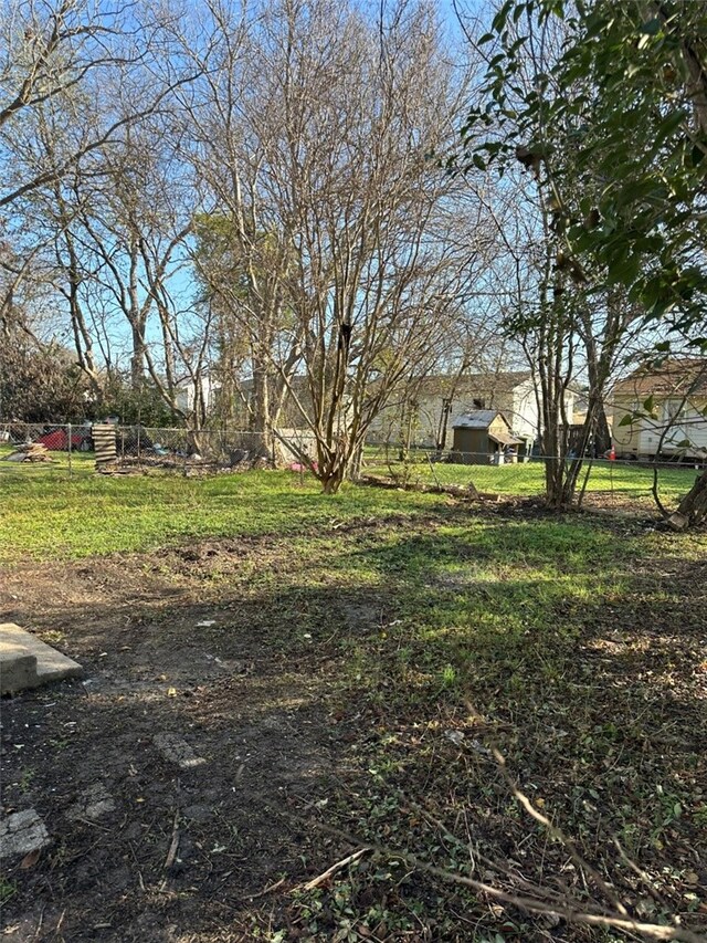 view of yard featuring fence