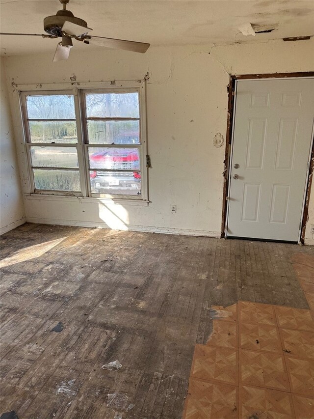 interior space with ceiling fan and hardwood / wood-style flooring