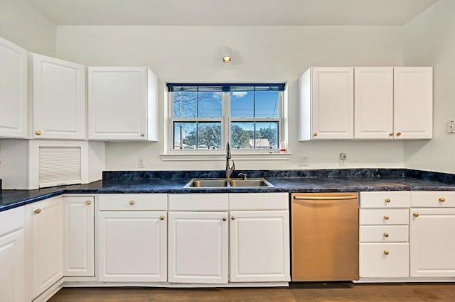 556 Old Speegleville Rd, Woodway, TX 76712 - kitchen with stainless steel dishwasher, a sink, and white cabinets