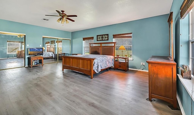 556 Old Speegleville Rd, Woodway, TX 76712 - bedroom featuring wood finished floors, ceiling fan, and baseboards