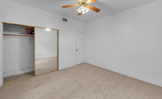 556 Old Speegleville Rd, Woodway, TX 76712 - unfurnished bedroom with carpet flooring, a closet, and ceiling fan