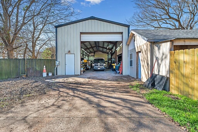 556 Old Speegleville Rd, Woodway, TX 76712 - view of outdoor structure featuring fence, an outdoor structure, and driveway