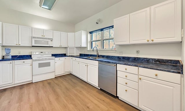 556 Old Speegleville Rd, Woodway, TX 76712 - kitchen with white appliances, a sink, and white cabinetry