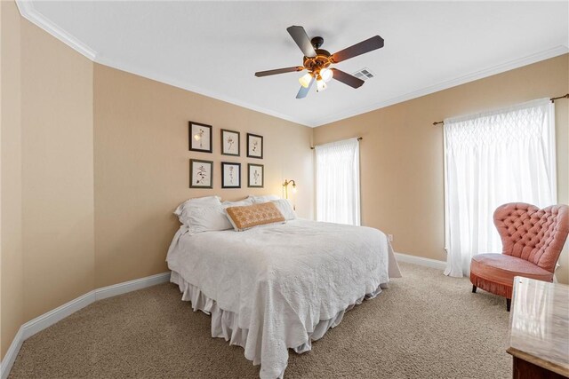 bedroom with light colored carpet, visible vents, crown molding, and baseboards