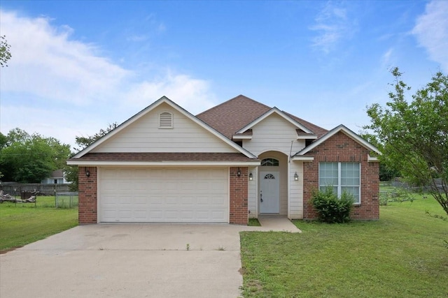 187 Ashland Dr, Woodway, TX 76712 - view of front of property with concrete driveway, brick siding, and a front yard