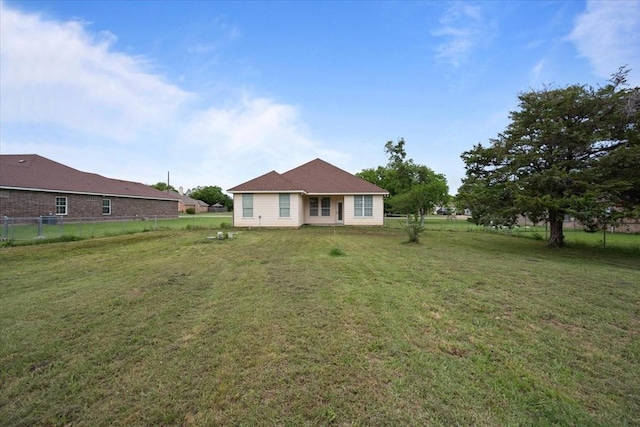 187 Ashland Dr, Woodway, TX 76712 - back of house with a lawn and fence