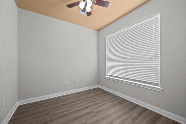 187 Ashland Dr, Woodway, TX 76712 - spare room with baseboards, ceiling fan, and wood finished floors