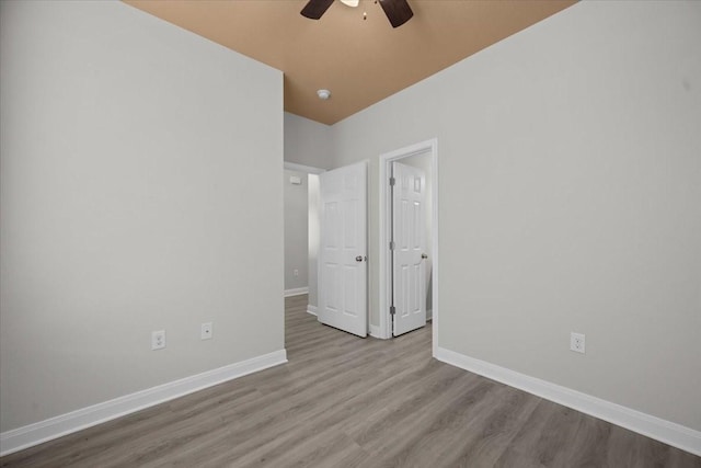 187 Ashland Dr, Woodway, TX 76712 - unfurnished room with baseboards, ceiling fan, and wood finished floors