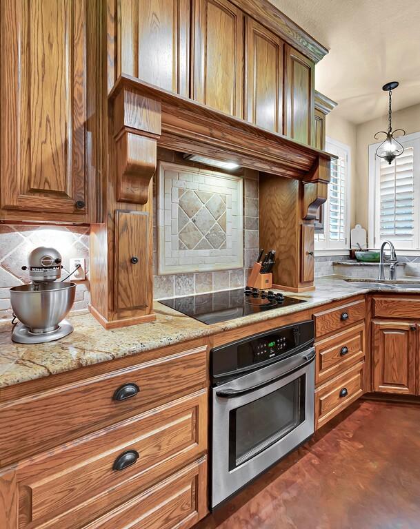 304 Chamberly Rd, Waco, TX 76712 - kitchen featuring a sink, decorative backsplash, stainless steel oven, and black electric stovetop