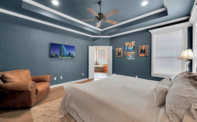 304 Chamberly Rd, Waco, TX 76712 - bedroom featuring recessed lighting, a tray ceiling, ornamental molding, and wood finished floors