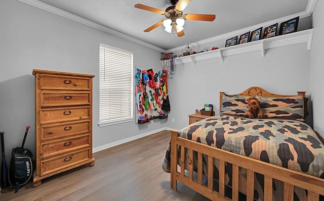 304 Chamberly Rd, Waco, TX 76712 - bedroom featuring crown molding, baseboards, wood finished floors, and multiple windows