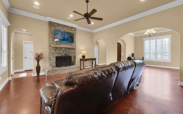 304 Chamberly Rd, Waco, TX 76712 - tiled living area with a stone fireplace, baseboards, ceiling fan with notable chandelier, ornamental molding, and recessed lighting