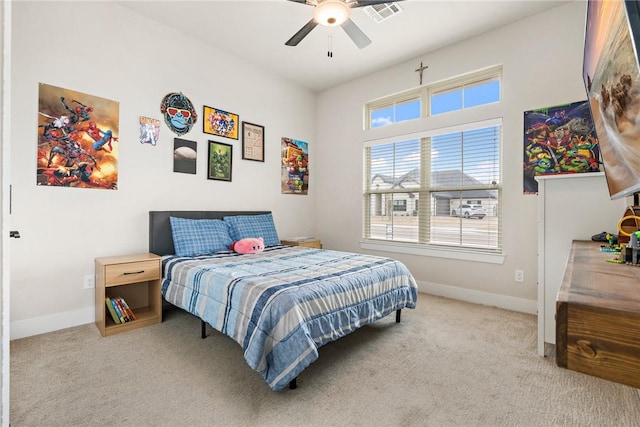 bedroom with a ceiling fan, baseboards, carpet, and visible vents