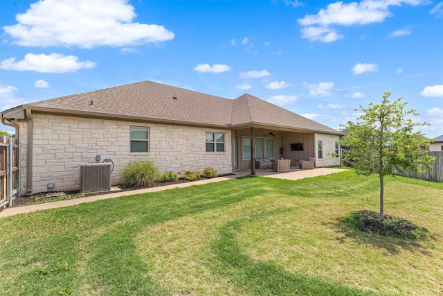 back of house with central AC, a patio area, a shingled roof, a fenced backyard, and ceiling fan