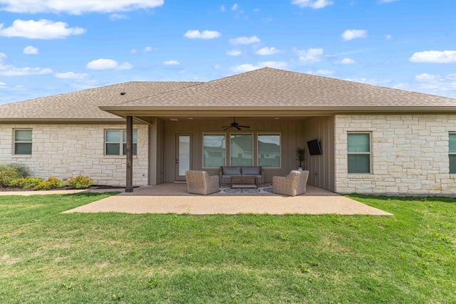 rear view of house featuring stone siding, a shingled roof, a patio, an outdoor hangout area, and ceiling fan