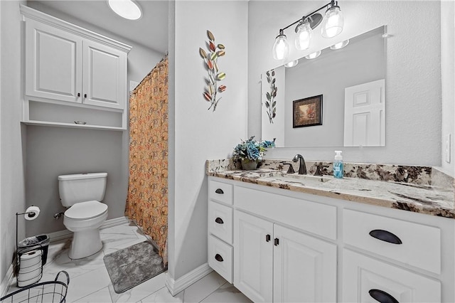 full bathroom featuring baseboards, toilet, marble finish floor, and vanity