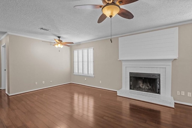 102 Pleasant Grove Ln Unit 102, Waco, TX 76712 - unfurnished living room with visible vents, wood finished floors, ceiling fan, and crown molding