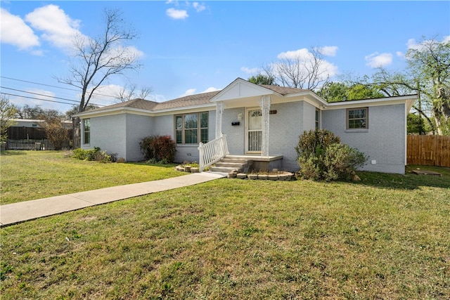single story home with brick siding
